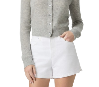 Person wearing a gray cardigan and white shorts on a white background