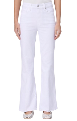 White flared jeans worn by a person on a white background