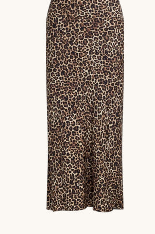 A leopard print midi skirt in brown, beige, and black, shown against a plain off-white background.