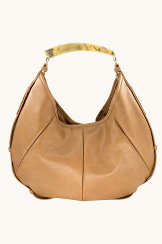 A tan leather hobo shoulder bag with a distinctive marbled yellow and green glass handle, shown against a plain off-white background.